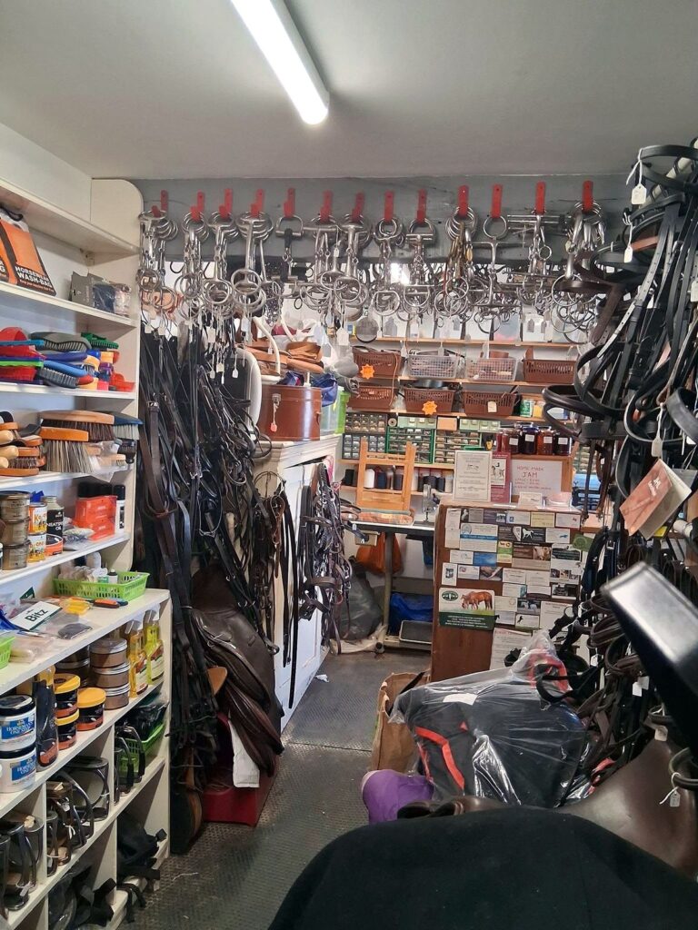 Inside The Newark Saddler — grooming brushes, leather care products and rows of bridlework